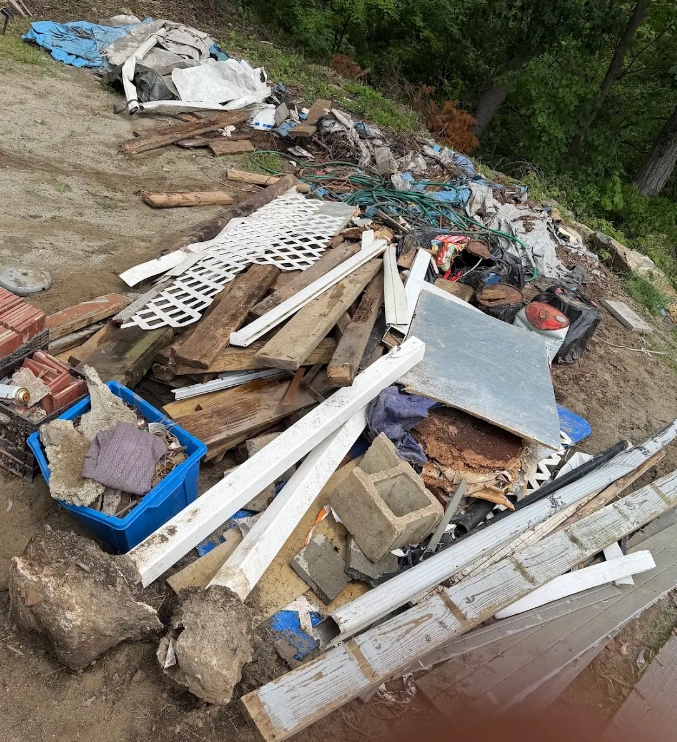 Construction debris pile before cleanup