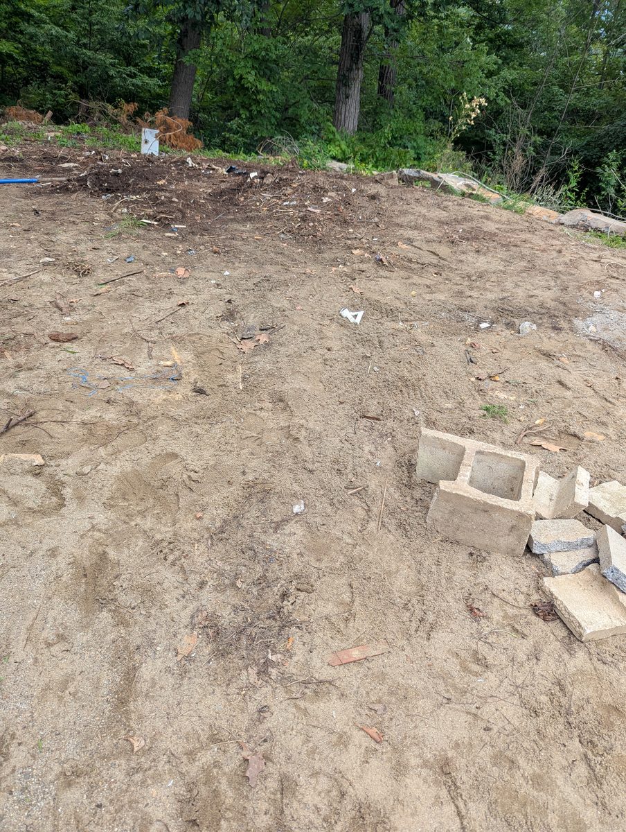 Cleared backyard area after debris pickup in Warwick, New York